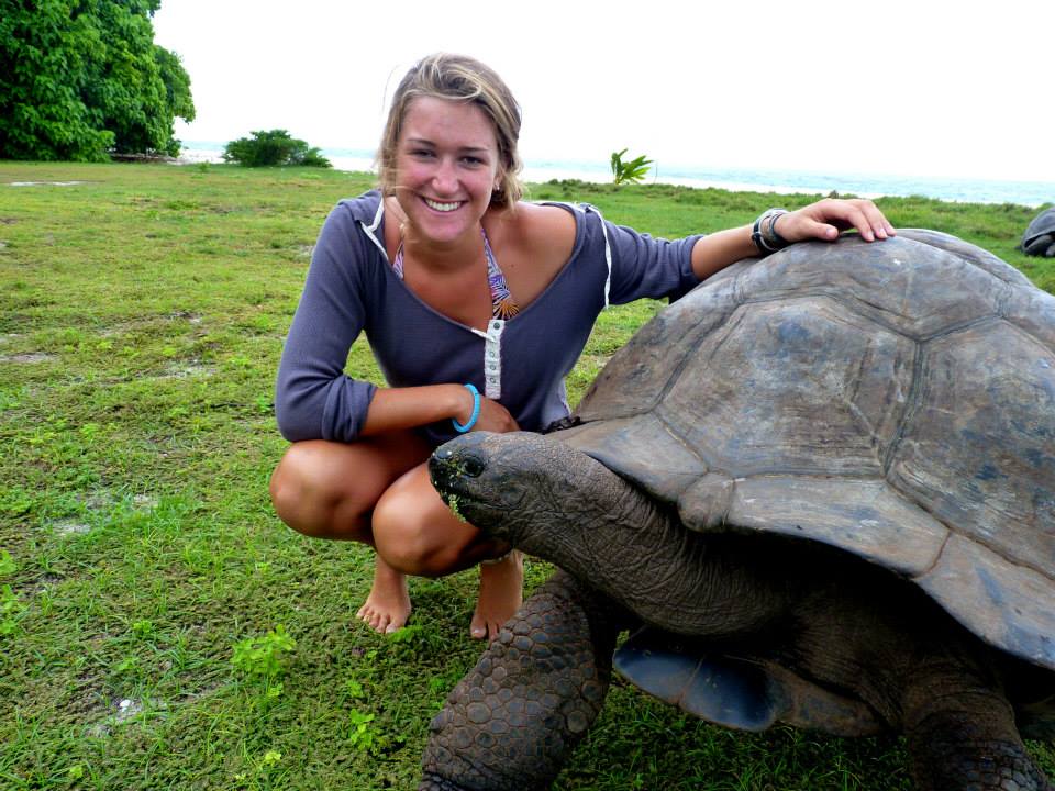 photo of Catherine McNichol and giant turtle